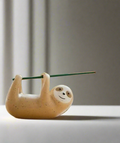 Kerala crafted incense stick holder with intricate animal design